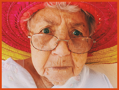 Grandma in glasses, looking shocked