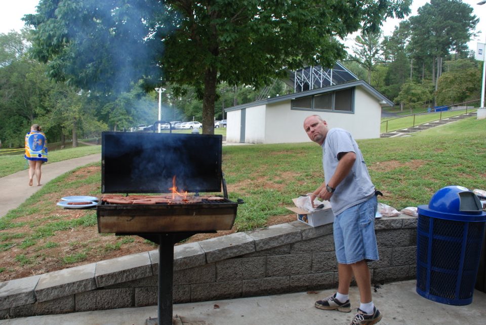 Cooking hamburgers at the grill