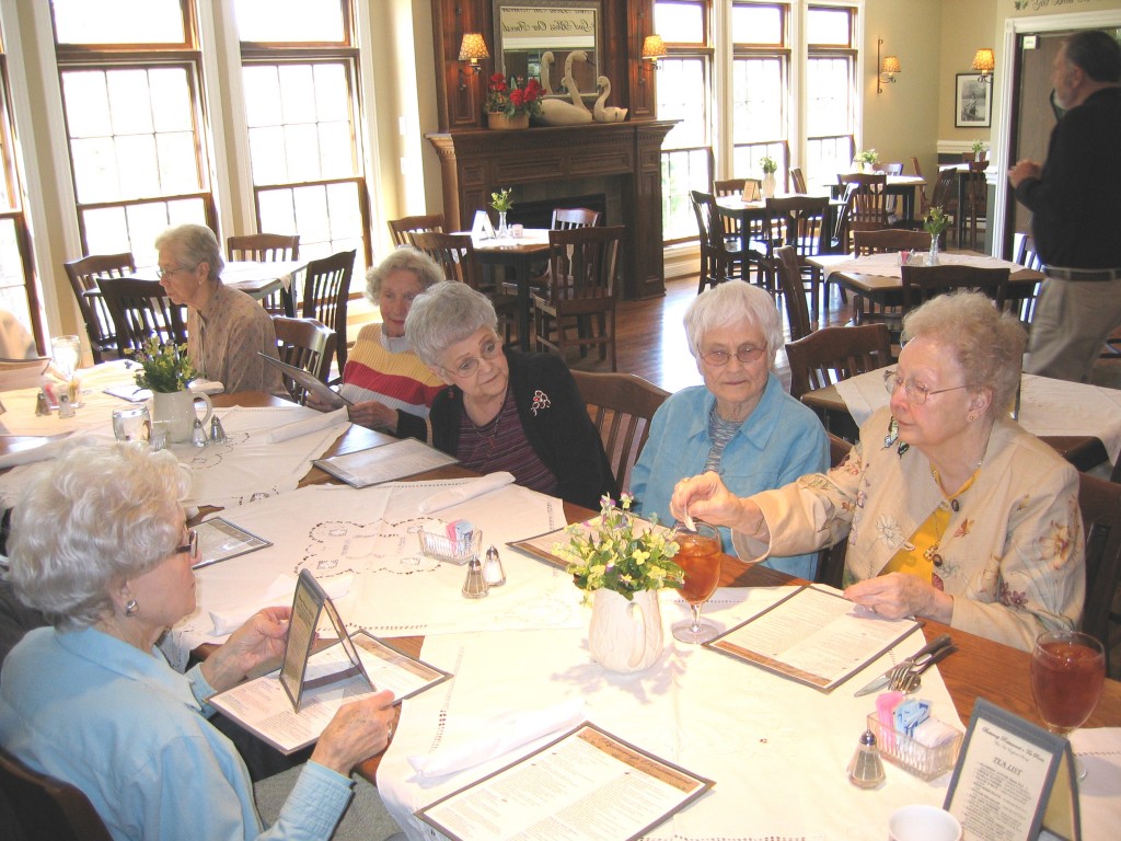 Members having dinner at Cranberry Hollow