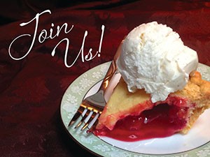 Join Us! A white plate holding cherry pie and vanilla ice cream