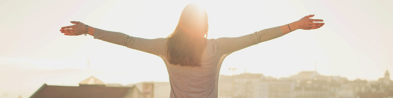 woman with outstretched arms