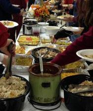 Table with potluck dishes