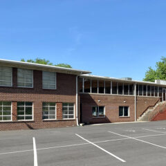 View of the Agape Center door from the back parking lot of the church