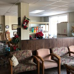 Four chairs in the Agape Center waiting area