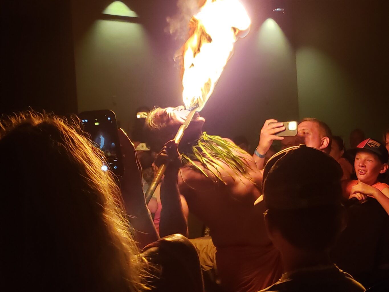 Hawai'ian man licking a flaming torch